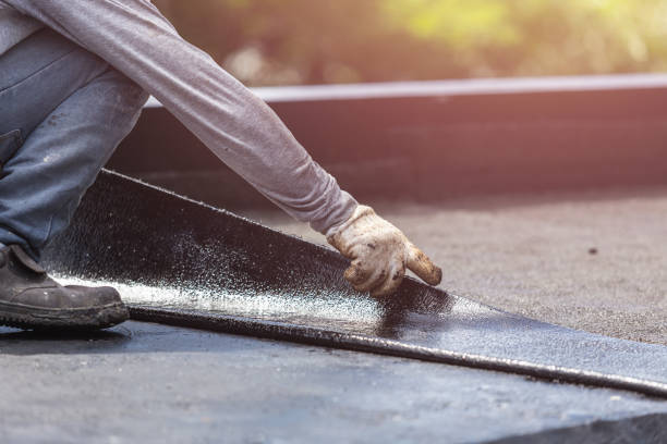 Professional Waterproofing technician working in Johnson City, NY